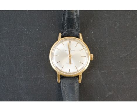 Lady's 18ct Gold Eterna-Matic Sahida Wrist Watch with silvered dial, case no. 5049462, diameter 2.3cms, on a black calf strap