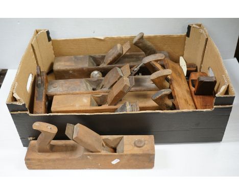 A collection of vintage carpenters wood planes to include wooden block planes as well as Stanley and Bailey examples 