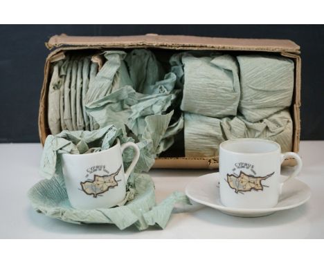 A vintage coffee set decorated with the image of the island of Cyprus. 