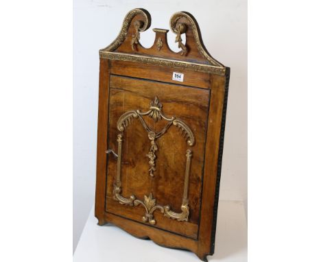 19th century style Hanging Corner Cupboard, the swan neck pediment and single panel door with gilt mouldings, opening to reve