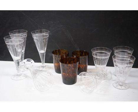 A set of vintage amber glasses together with other glasses 