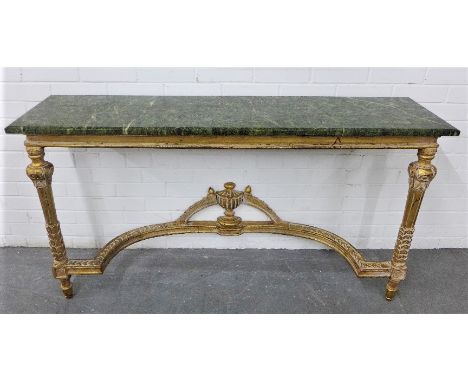 French giltwood console table with a rectangular green marble / hardstone top, with a plain frieze, laurel leaf legs and cent