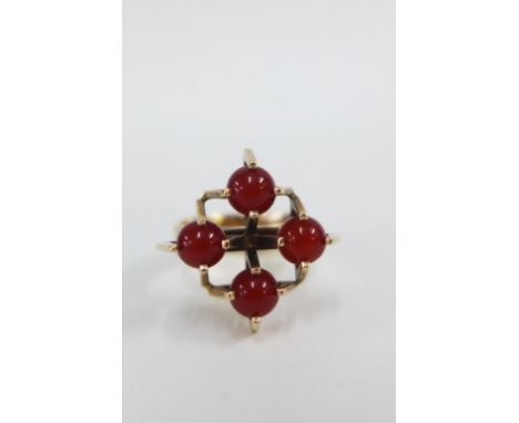 Vintage Kupittaan Kulta 9ct gold ring of Modernist design, claw set with four carnellian,  stamped Finland NB 9k