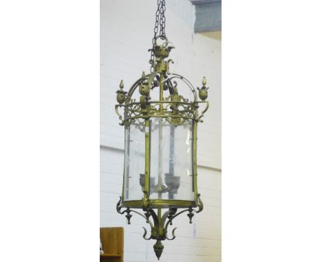 A large brass hanging lantern light with domed top and urn finials, over engraved  glass panels, with three lights, 98 x 42cm