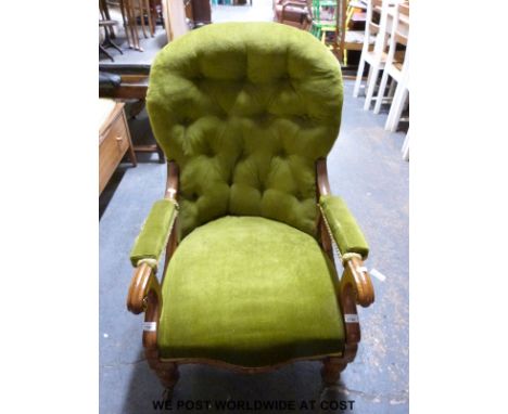 A 19th century oak framed upholstered armchair, serpentine fronted, raised on ceramic castors