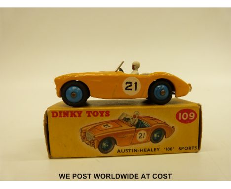 Dinky Toys diecast model Austin Healey '100' Sports with yellow body and blue interior and hubs, racing number 21, 109, in or