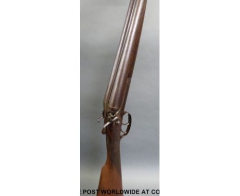Unnamed 12 bore side by side hammer action shotgun with ornately engraved side locks and hammers, double trigger and 29.75 in