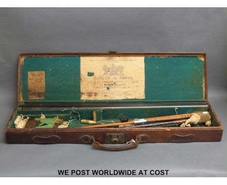 A pair of Hooton & Jones Liverpool 12 bore Damascus shotgun barrels named to the rib, 30 inches long, in leather gun case wit