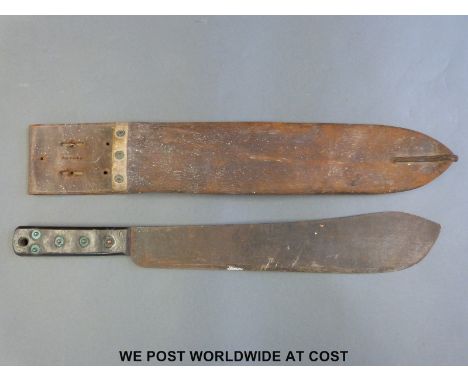 A WWII machete stamped JJB 1944 and with broad arrow above, in leather scabbard also stamped D  M & S Ltd 1944