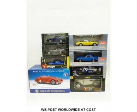 Eight Franklin Mint, Sun Star, Burago, Onyx and Superior Models large scale diecast model cars including 1937 Alfa Romeo 2900