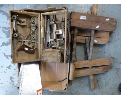 A cased Sargent combination router plane, three vintage wooden clamps, brass and rosewood square, bit and saws etc.