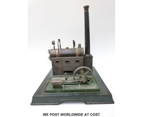 Marklin stationary live steam engine with slip eccentric reversing, imitation governor, whistle, lever safety valve and three
