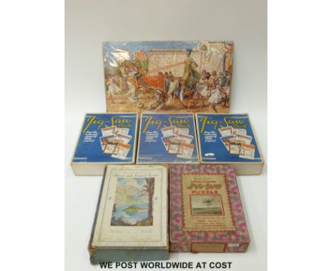 Six vintage jigsaw puzzles including ' A Present From Caesar', Queen Nefertiti and 'The Schneider Trophy Race', all in origin