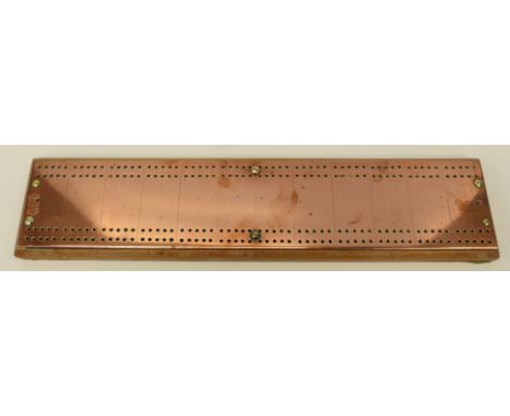 A large copper topped cribbage board (length 52cm)
