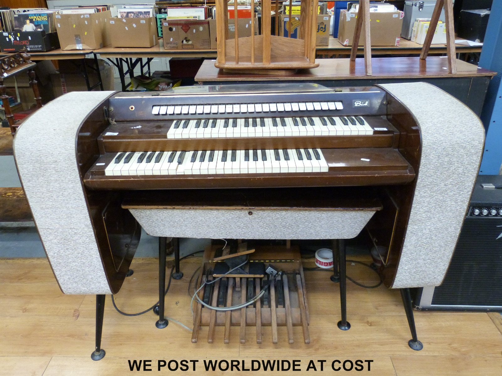 A circa 1960s double keyboard electronic organ by Bird, with full
