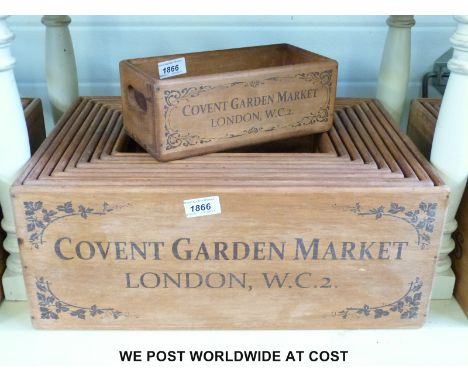 A set of ten wooden vintage style storage/retail boxes with fruit theme, largest 48cm long