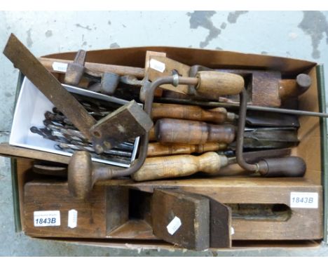 A quantity of vintage woodworking tools, including chisels, planes etc.