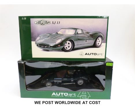 Two Autoart 1:18 scale diecast model vehicles, Jaguar XJ13 and Jaguar C Type, both in original boxes