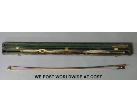 Two violin bows, one in a case, both with white metal/mother of pearl decoration 