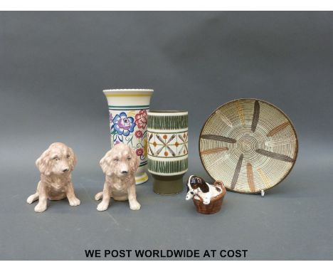 Poole pottery vase, Royal Doulton spaniel pup in basket, Sylvac style dogs etc