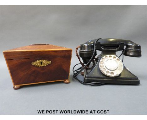 A vintage telephone - rewired for the modern home and an early 19th century tea caddy with lining raised on bun feet