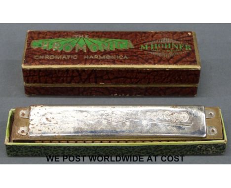 Hohner Chromatic 10 hole harmonica, key of C, in original box, together with a twenty hole Hohner 'Songbird' example, tremolo