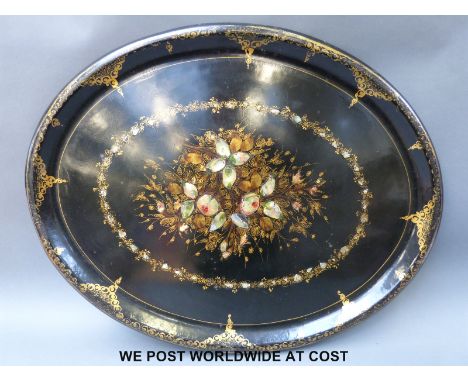 A large mother of pearl inlaid and gilt decorated papier mache tray, 76x60cm