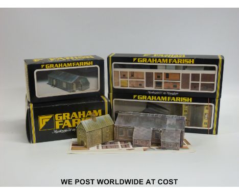 A collection of Graham Farish N gauge buildings, together with a powerbox 300 transformer, some in original boxes. 