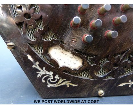 A mid nineteenth century English concertina with rosewood fretworked ends decorated with mother of pearl inlay, 48 metal keys