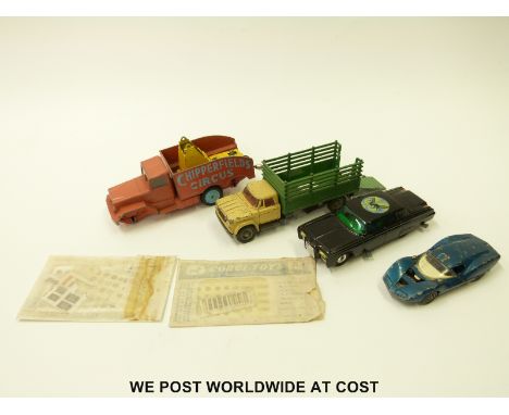 Four Corgi diecast model vehicles together with various sheets of Corgi decals