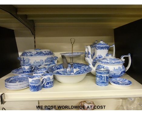 A collection of Copeland Spode Blue Italian tea and dinner ware to include tureen, two coffee pots, teapot, carving set, cake