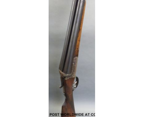 Unnamed 12 bore side by side shotgun with ornate engraving, double trigger and matt rib to the 28 inch barrels, serial number