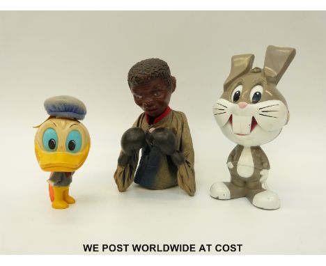 A Mohammed Ali boxing action hand puppet together with a mattel pull string Bugs Bunny toy and a Burbank Toys Donald Duck toy