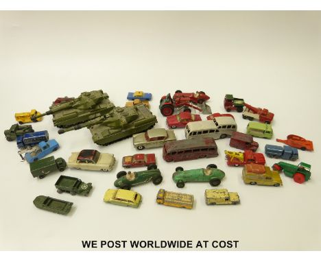 Thirty-six Dinky, Corgi and Matchbox diecast model vehicles including military, Formula 1 cars, etc