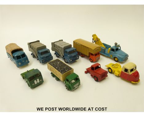 Nine Budgie Toys diecast model vehicles including rubbish wagons and towing truck. 