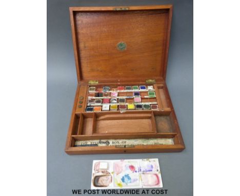 A vintage wooden watercolour box The Students' Box of 'Landseer' watercolours with ceramic mixing palette and some original p