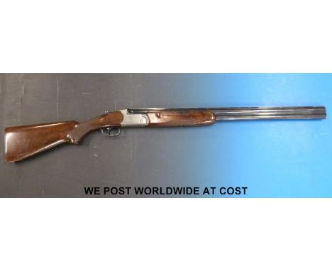 AYA Yeoman 12 bore over and under shotgun with chequered grip, single trigger and vented top rib to the 28 inch barrels, seri