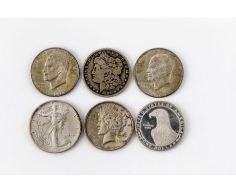 Konvolut von sechs US-Silberprägungen: Morgan Dollar 1889 O  (ss-), Liberty Dollar 1924, Eisenhower Dollar 1971 und 1976, One