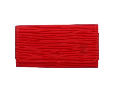 LOUIS VUITTON Schlüsseletui, Koll. 2001. Epi Leder Serie in Rot mit Halterung für vier Schlüssel. Leichte Altersspuren. | LOU