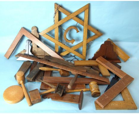 An oak 'G' within a star, fitted with a hanging chain, 45cm, various gavels and wooden Masonic working tools, squares and mis