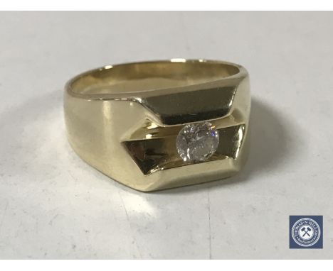 An 18ct gold solitaire diamond ring, size R. CONDITION REPORT: The ring is in good condition. It is not hallmarked but tests 