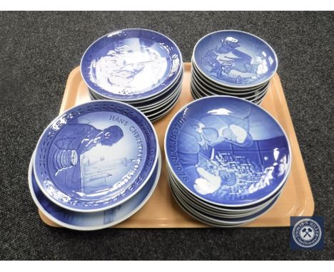 A tray containing thirty-five Royal Copenhagen and Bing &amp; Grondahl plates of the Year