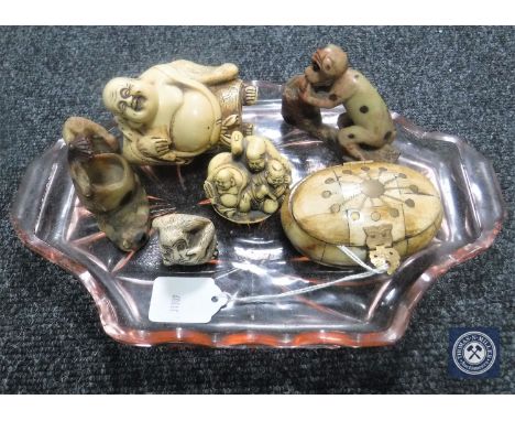 Two soapstone figures together with a carved netsuke, two carved buddhas and a lidded trinket dish