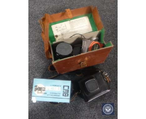 A Zenith EM camera with 3 lenses, bellows and accessories