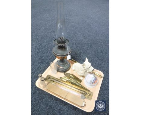 A tray of vintage copper oil lamp with chimney, pot metal figure of a terrier, brass flute, pair of silver rimmed vases, vint