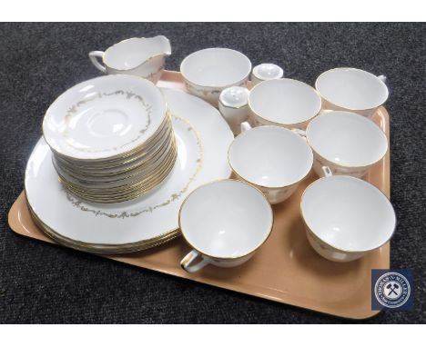 A tray containing twenty-three pieces of Royal Worcester white and gilt tea and dinner ware together with a pair of similar s