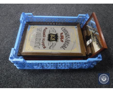 A basket of six framed picture mirrors - Scotch Whisky, Bells Whisky, Chivers Regal 