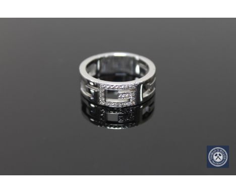 An 18ct gold diamond set ring by Gucci, 10.2g, (Cost £1,100 new) CONDITION REPORT: Size R. 