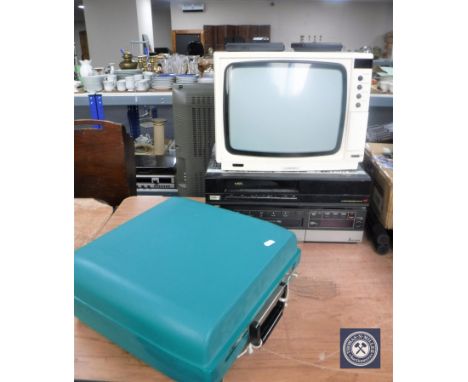 A vintage typewriter, a Ferguson PX TV, a Ferguson video star and a Mitsubishi video recorder 