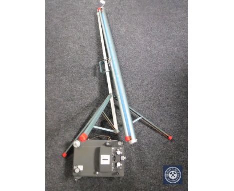 A projector screen on stand and a Lomax projector 